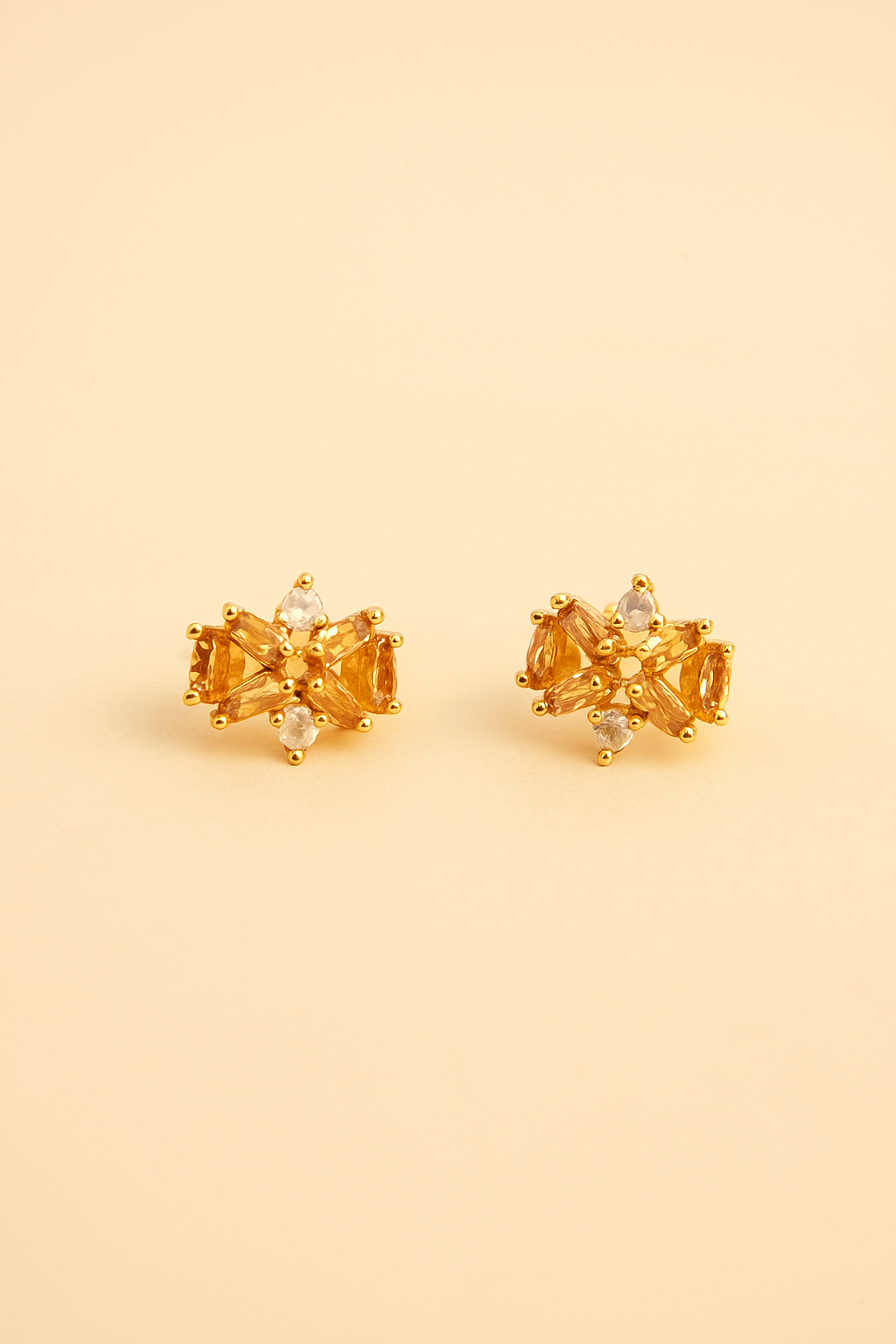 Golden ear studs by Zevari
